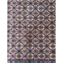 Northwestern Persian Hamadan carpet, hand-knotted, ivory field with an all-over Herati design of rosettes and serrated leaves within multiple borders, madder red with angular vine and rosette motifs, 375cm x 271cm 
