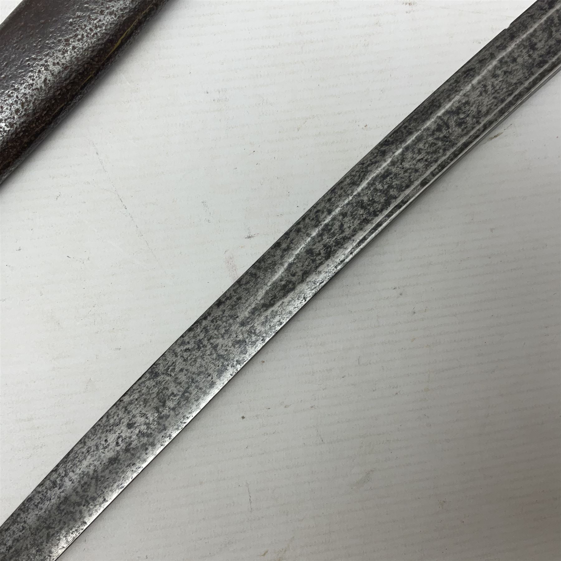 19th century French 1822 Pattern Light Cavalry trooper's sword with 88.5cm slightly curving fullered blade, brass three-bar hilt and wire-bound leather grip; in polished steel scabbard with two suspension rings L110.5cm overall