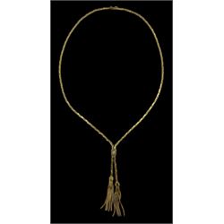 9ct gold tassel necklace set with a single round brilliant cut diamond, London import mark