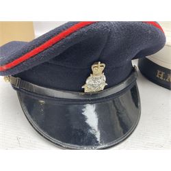 Five military caps/berets comprising two peaked caps with 'Yorkshire' and 'Royal Engineers' badges; maroon beret with parachute regiment badge; red beret with Military Police badge; and AB seaman hat with HM Submarines band; and a felt and webbing covered water bottle (6)