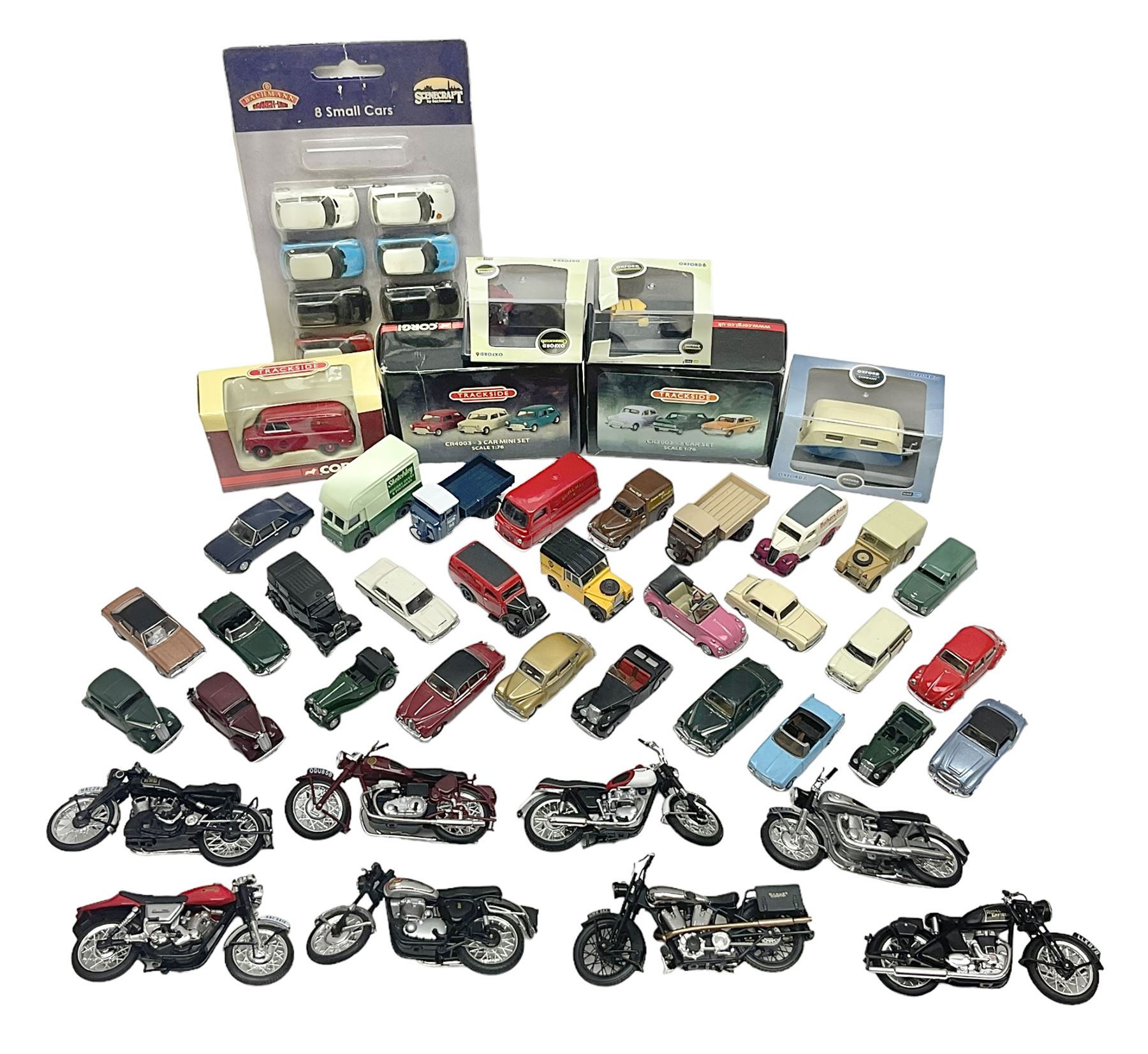 Over forty 1:76 scale die-cast models of cars and commercial vehicles; some boxed; and eight small scale models of motorcycles; all unboxed