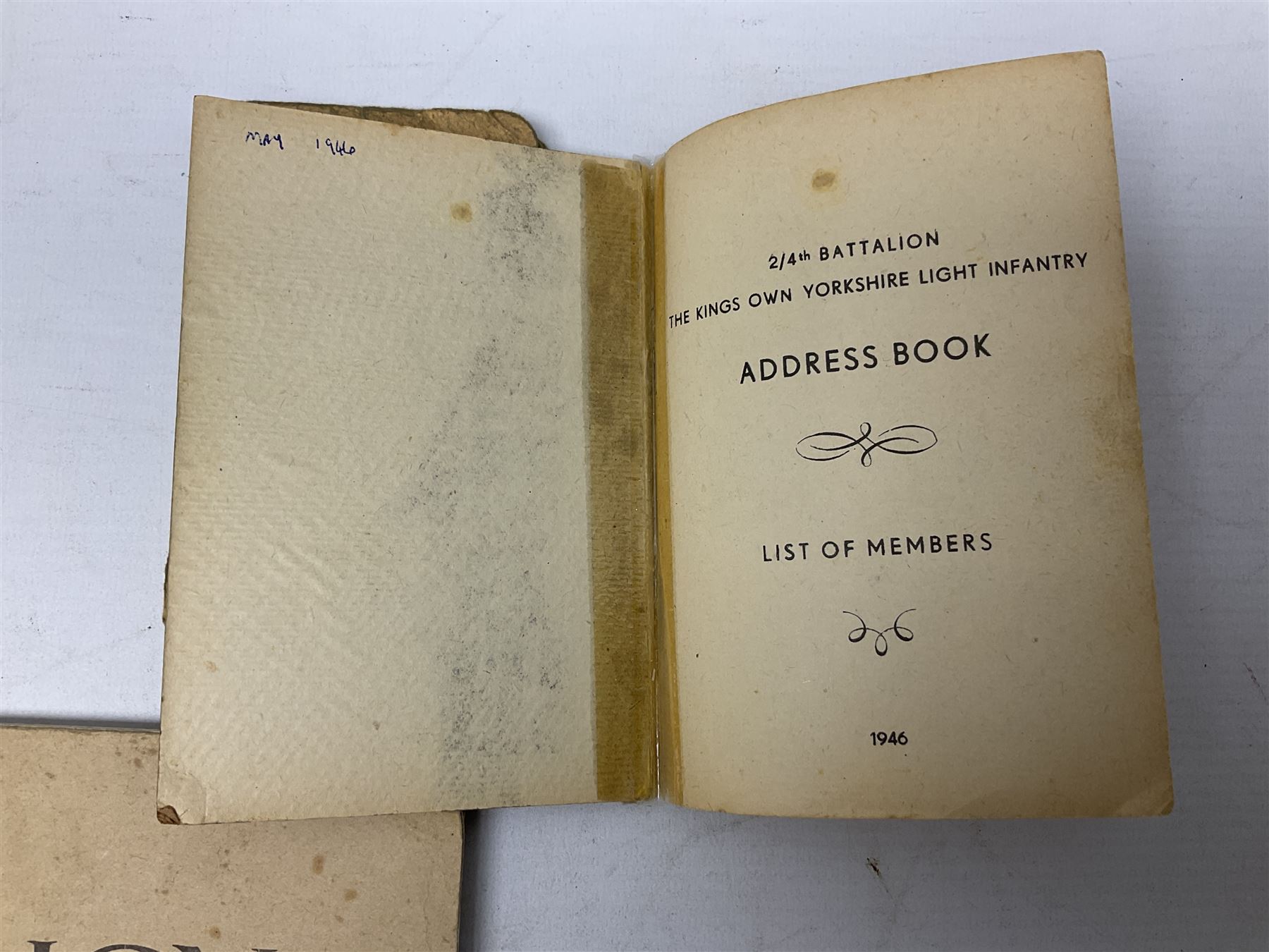 Modern album containing over sixty postcards and photographs including memorial portraits of KIA soldiers, regimental crests, comic, WW1 embroidered silk, uniforms, cap badges, camp and manoeuvre images etc; another personal photograph album of WW2 soldiers relaxing; Royal Armoured Corps booklet 'The Italian Campaign 3rd Sep. 1943 - 2nd May 1945; and other paper ephemera of military interest