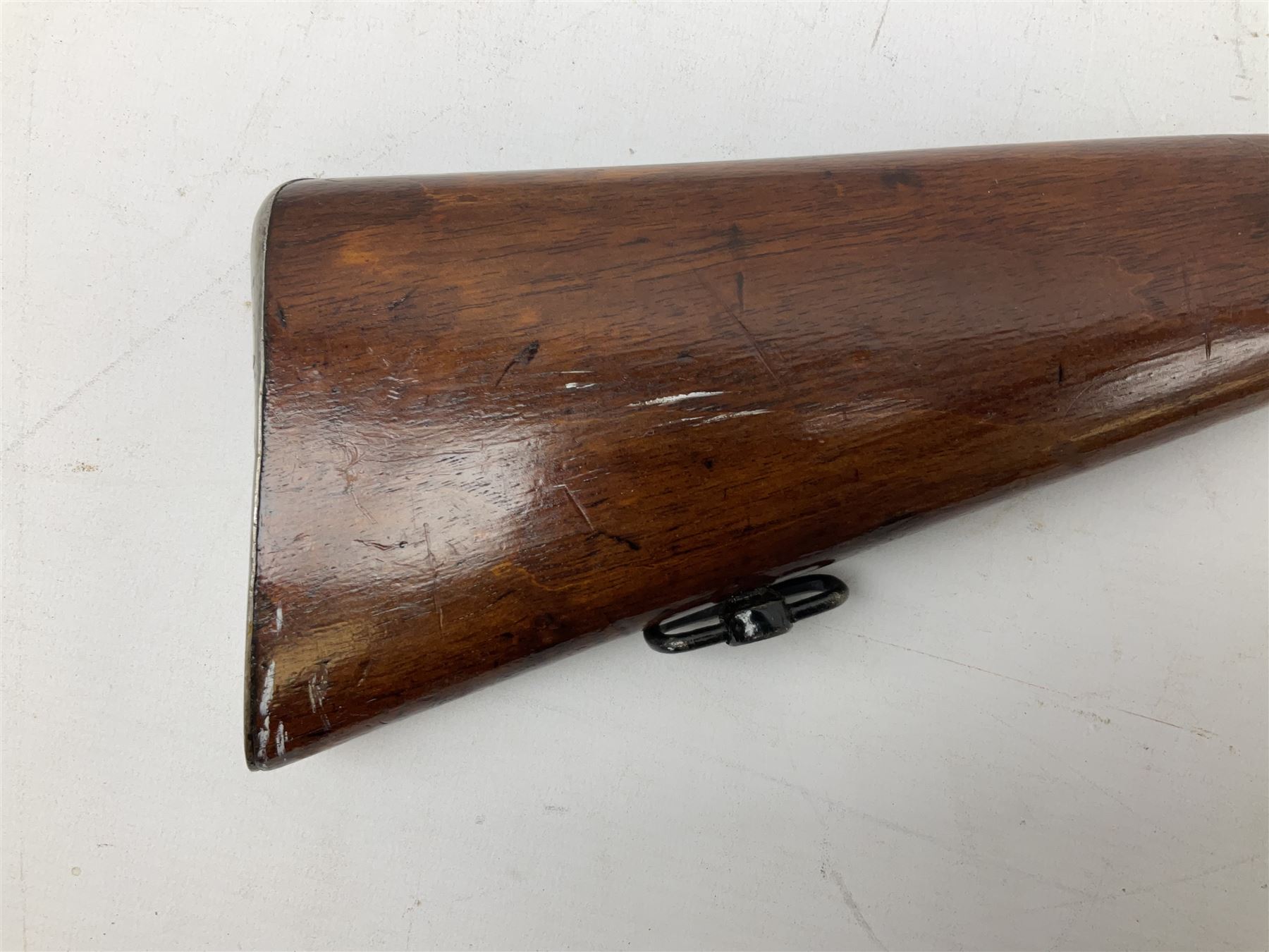 Westley Richards .310 Cadet Martini action rifle, the 63.5cm smooth bored barrel with one barrel band, walnut stock stamped 93/352 with hinged compartment to butt, serial no.3365, L103cm