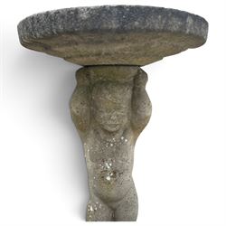 Assorted cast stone garden ornaments, comprising putto bird bath (W43cm H72cm), owl, dog, frog, rabbit and two squirrel figures, with two octagonal relief-moulded stepping stones, one decorated with central cat motif