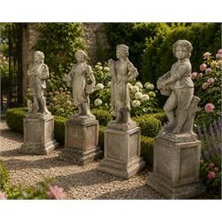 The Four Seasons - set of four traditional cast stone garden figures, in a weathered finis...
