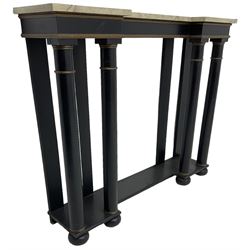 Italian design ebonised reverse-breakfront console table, painted simulated marble top over ebonised pilasters with gilt piping, platform base on compressed bun feet
