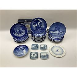 Collection of eighteen Royal Copenhagen Christmas plates 1955-2000, four Bing and Grondahl saucer dishes and three plates

