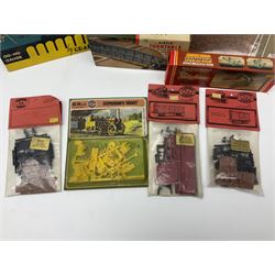 '00' gauge trackside accessories including Metcalfe kits for Platform, Goods Shed and Signal box, Superquick locomotive shed, Airfix kits for locomotive, wagons and buildings etc, Dapol Station Accessories and Turntable, six Parkside Dundas wagon kits, Hornby Footbridge etc; most boxed or packaged