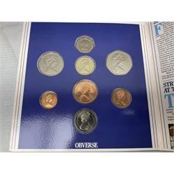 The Royal Mint United Kingdom 1984 brilliant uncirculated coin collection, 1997 and 2001 commemorative crown coins, 1997 old round one pound, all in card folders and four sterling silver medallic first day covers from the 'Great Britons' collection housed in a blue folder