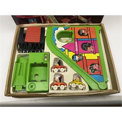 Mickey Mouse Trick Star battery operated drummer figure; Illco Mickey Mouse battery operated Fun Castle Roller Coaster; battery operated Western Express Locomotive; and JK Wells Fargo Overland Stage scale model; all boxed (4)