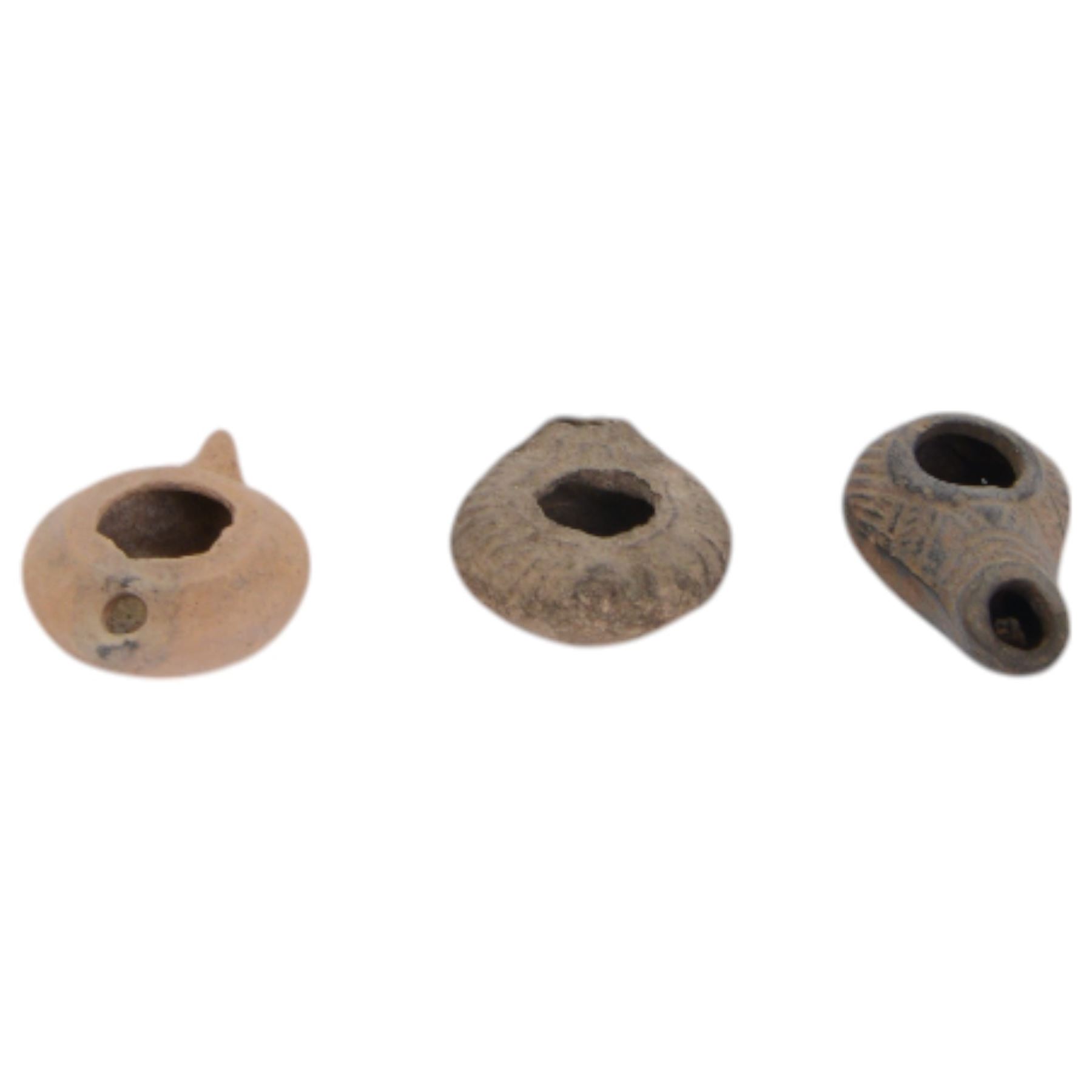 Antiquities; Persian terracotta oil lamp, 4th century BC, decorated in relief together with two later examples