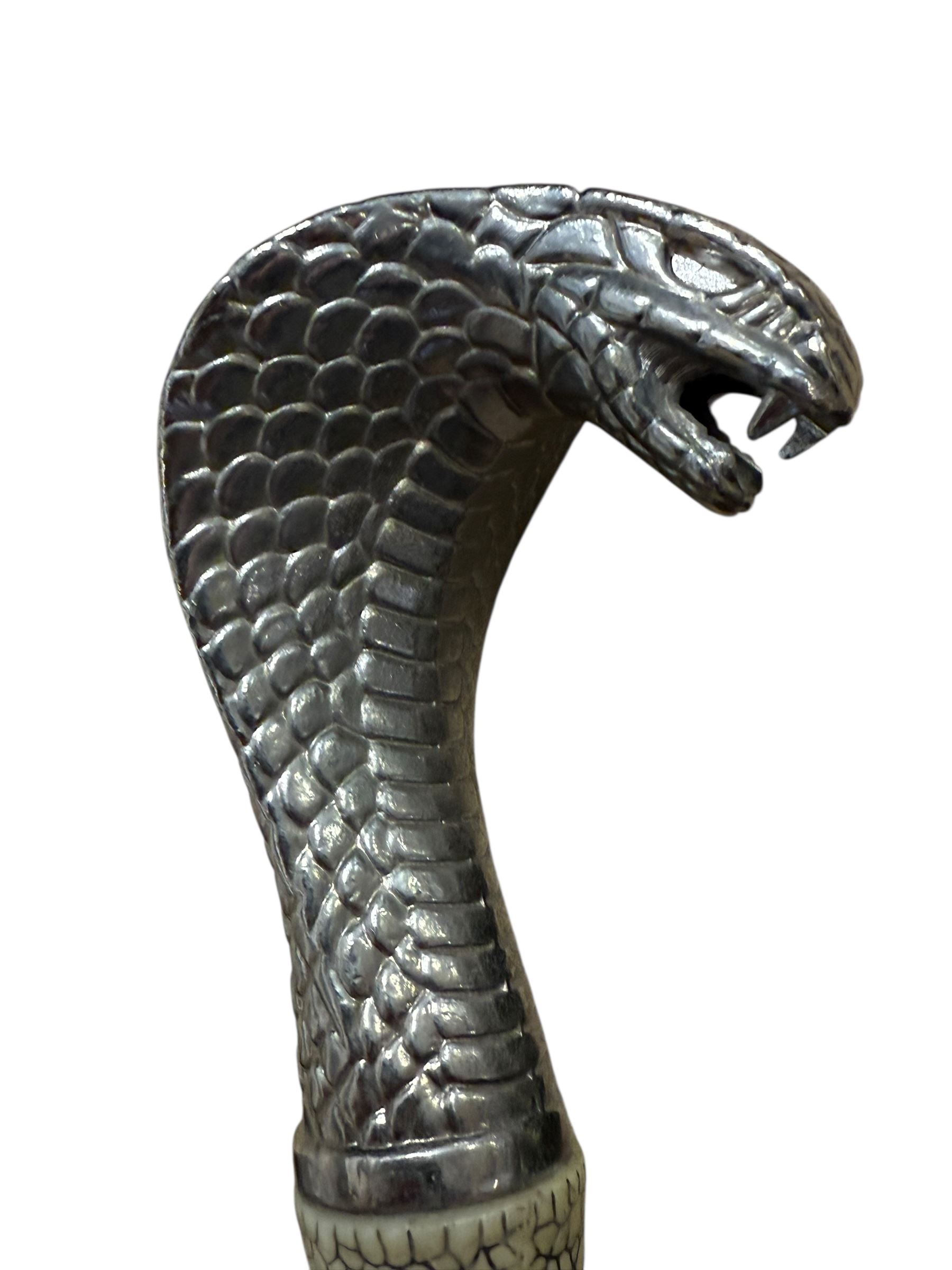 Set of three Ancient Warrior decorative swords, largest L106cm