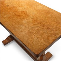 Mouseman - oak side table, rectangular adzed top, raised on octagonal supports united by stretcher on sled feet, with carved mouse signature, by the workshop of Robert Thompson of Kilburn