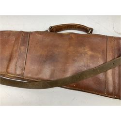 Fleece lined leather gun sling with former owners brass plaque L117cm,  leather jerkin, two leather cartridge bags, leather 12-bore cartridge belt and two-piece gun cleaning rod