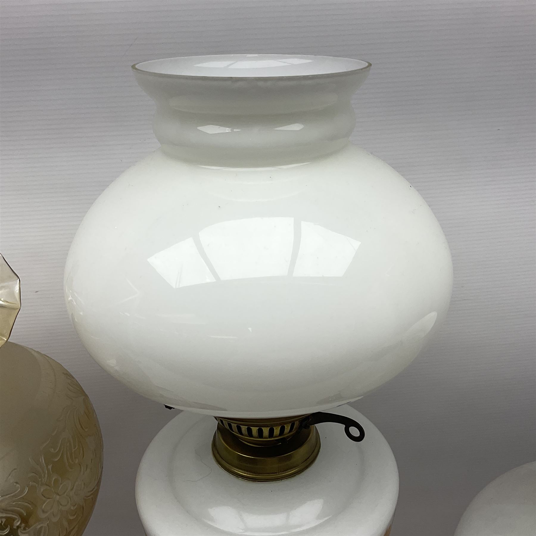 Brass Corinthian column oil lamp, upon stepped marble base, together three other brass table lamps, tallest H68cm