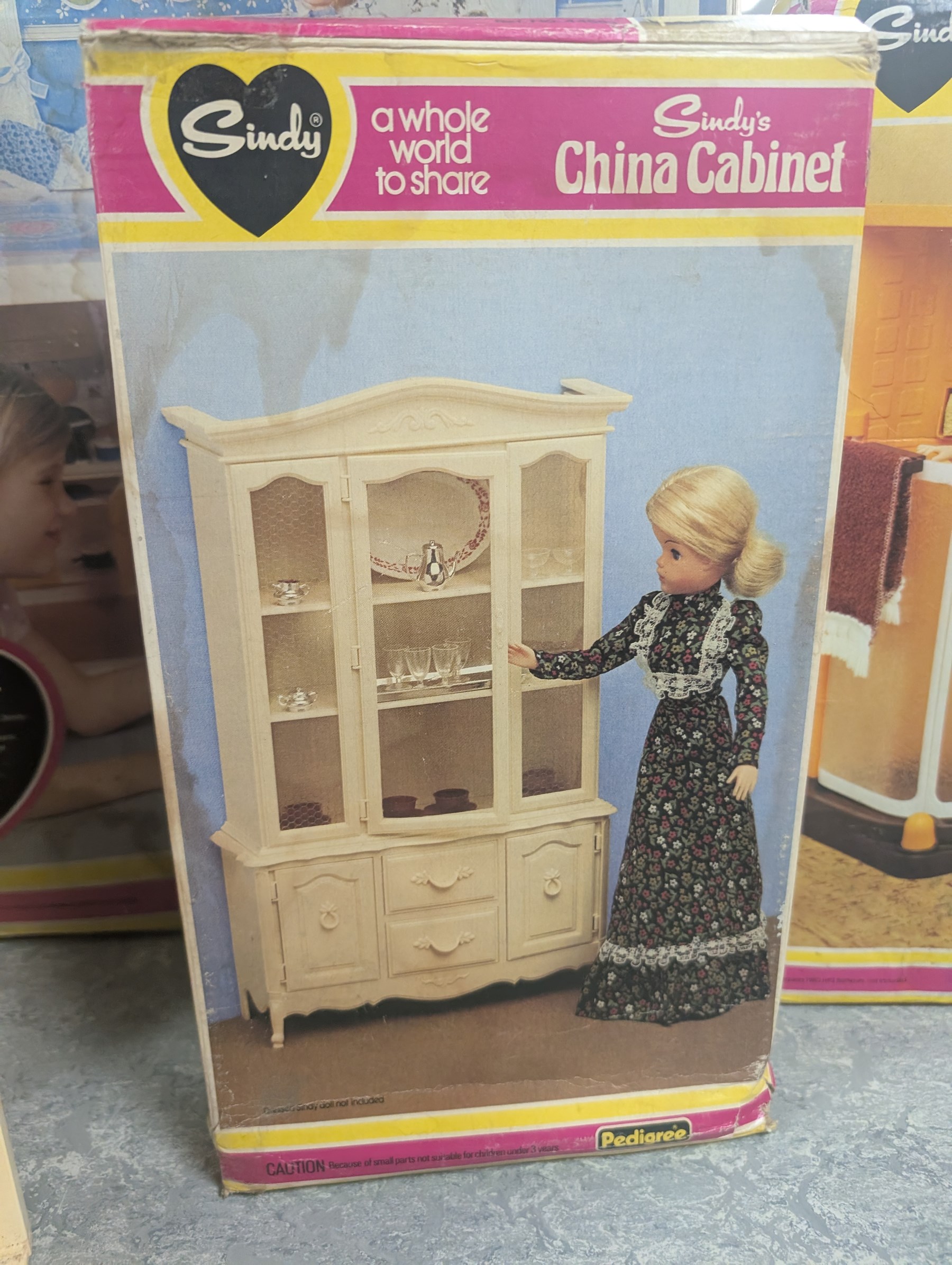 Pedigree Sindy's House and furniture, including shower, kitchen unit, washbasin, china cabinet and bed, all boxed, together with Barbie doll and horse