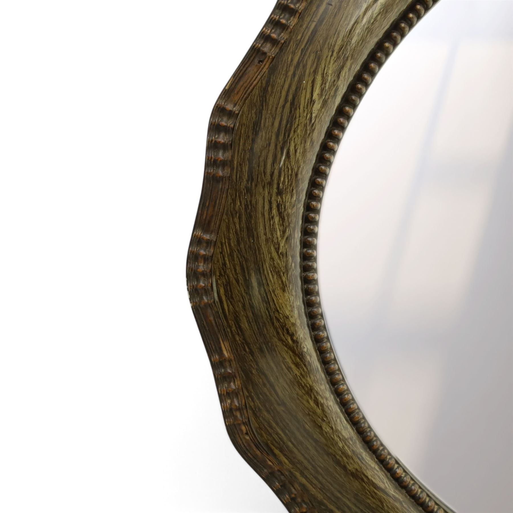 Oval wall mirror, shaped frame with bevelled plate 