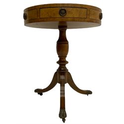 Georgian style mahogany drum table, circular leather inset top on turned column with three splayed supports, hair paw castors
