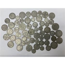 Approximately 440 grams of Great British pre-1947 silver coins, including sixpences, shillings, florins etc. 