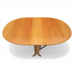 Nathan - teak drop leaf dining table and four Nathan dining chairs, the rectangular top with rounded corners fitted with twin hinged drop leaves and gate legs, extended to form an oval table 174cm in length, raised on square section supports united by stretchers, the chairs with teak frames and padded beige upholstered seat (H 96cm, W 48cm)