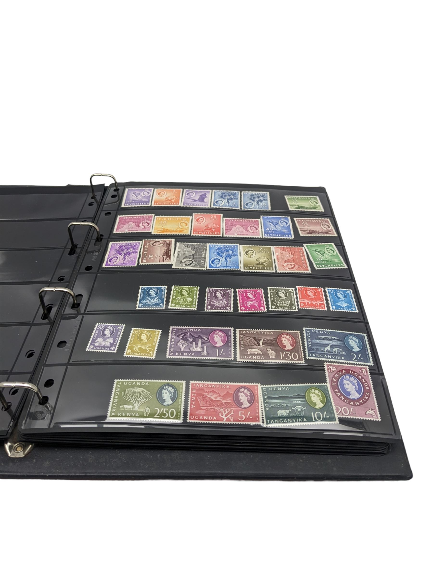 Mostly King George VI and Queen Elizabeth II Commonwealth or Empire stamps, including QEII British Solomon Islands, Pitcairn Islands, Seychelles, Sierra Leone, Mauritius, Guernsey etc, KGVI Turks and Caicos Islands, Falkland Islands Dependencies etc, mixture of mint and used values with some higher values