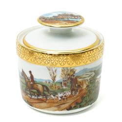 Limoges  coffee set decorated with hunting scenes within a gilt border comprising twelve cups and saucers, coffee pot, cream jug and sugar bowl