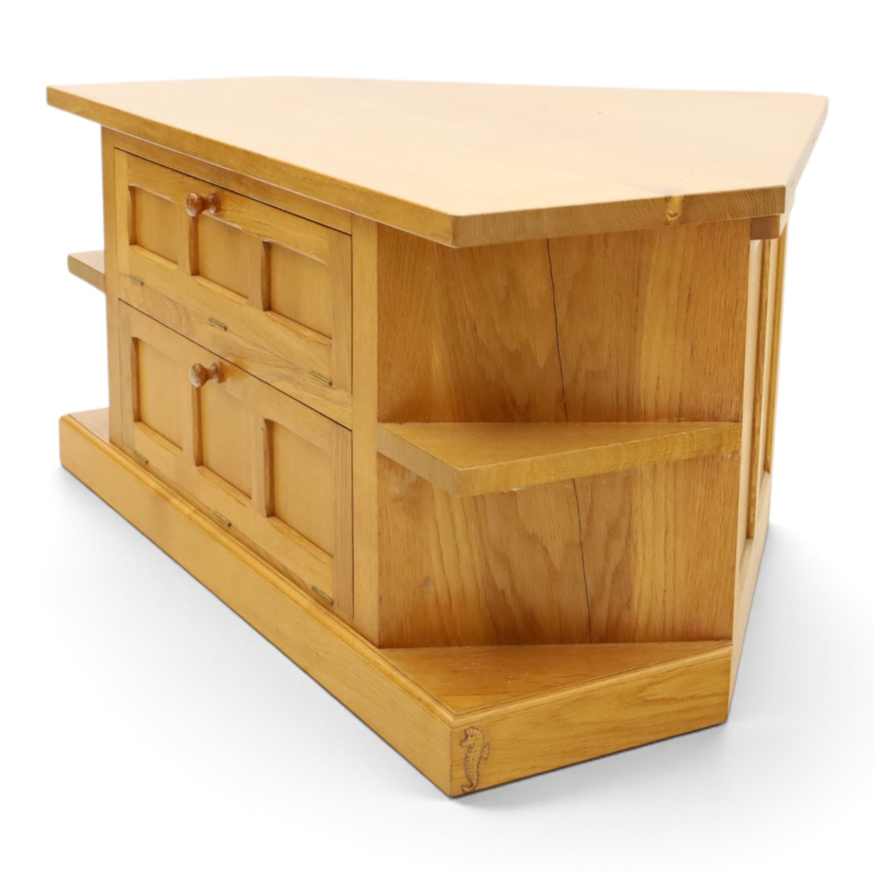 Seahorseman - craftsman made Yorkshire oak corner media unit, fitted with two panelled fall-front compartments flanked by open corner shelves, carved with seahorse signature, by Shaw and Michael Riley, Hessay, York

