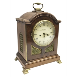 19th century mahogany bracket clock, white enamel Roman dial inscribed 'Cousens, 61 George St. Portman Squ. London', arched top case with brass fishscale frets, handle, bracket feet, and bezel with convex glass door, twin fusee movement striking the hours on a bell, H42cm, W29cm, D18cm