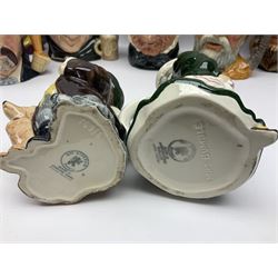 Large collection of Royal Doulton character jugs, to include Robinson Crusoe D6532, Tam O Shanter D6632, The Falconer D6533 etc, together with similar charater jugs and toby jugs   