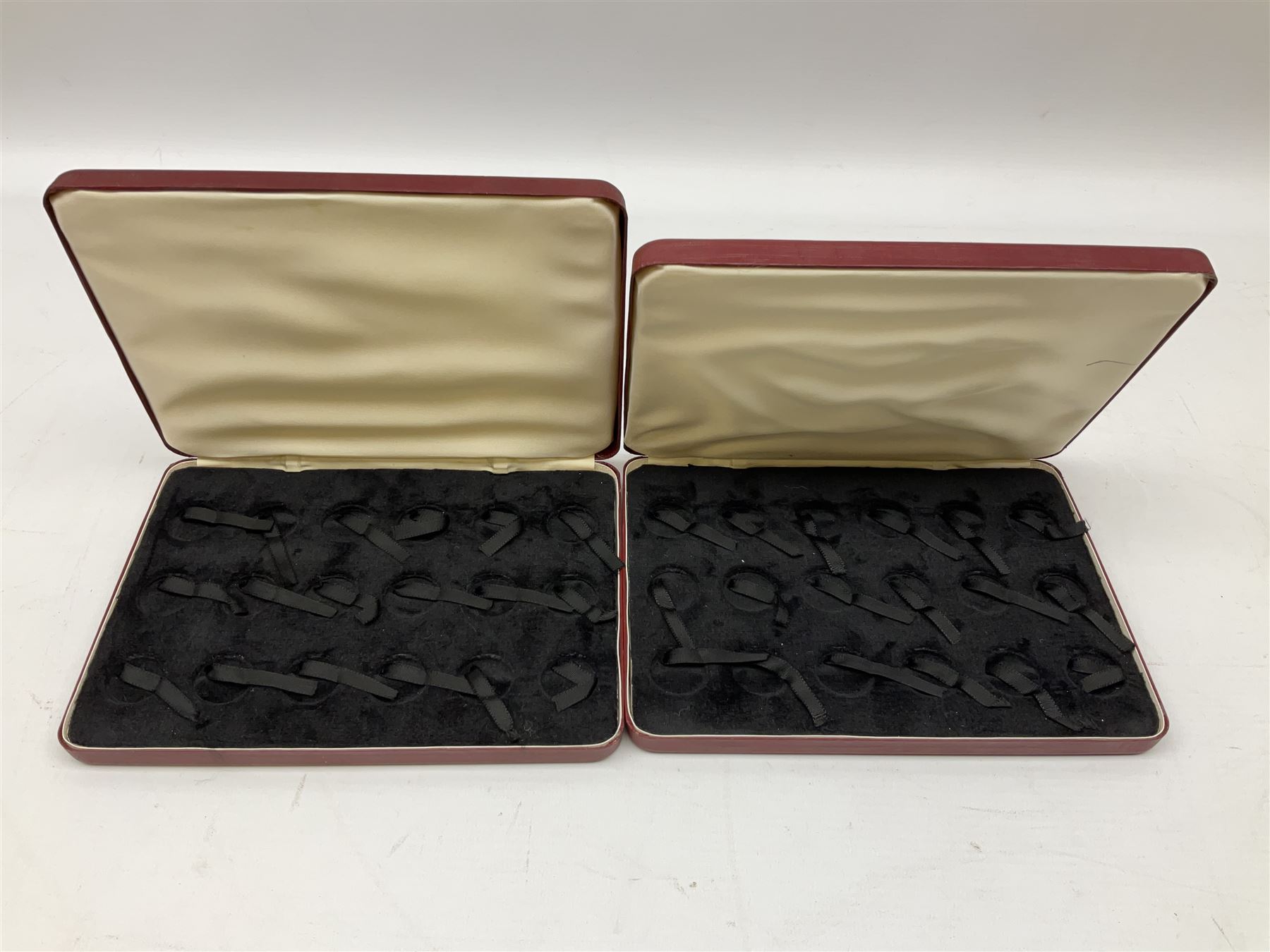 Empty coin boxes, three to house ten half sovereigns each, four to ...