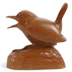 20th century walnut carvings, the first modeled as a wren, the second an otter, H  Two Yorkshire style walnut carvings, of a wren and otter, otter H10cm
