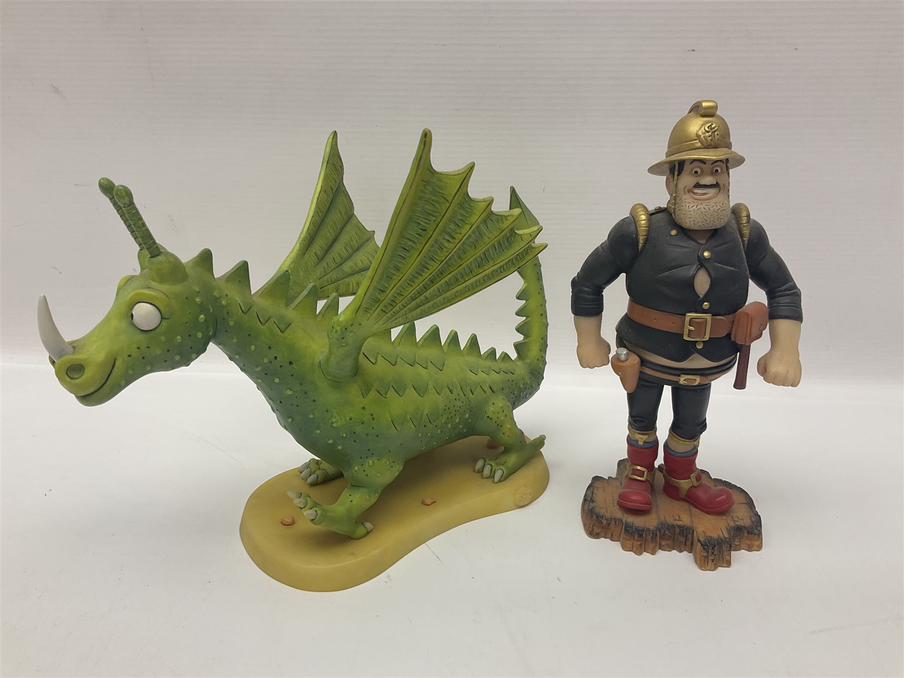 Eleven Robert Harrop figures from various collections, comprising limited edition The Trumpton Fire Engine Musical Box CGMB8 no. 359/1000, The Dragon from the Red Knight BN09, Bulldog Fireman DP165, Pointer Fire Chief DP184, Dalmatian New York Fire Fighter DP234, Dalmatian Fire Fighter DP191; Desperate Dan ‘Fireman Dan’ BDS11, Cuthbert CG13, Pugh (Clarinet) CG70, The Soup Dragon CL05 and Baby Dragon CL06