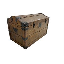 Late 19th to early 20th century oak framed travelling trunk, dome top with iron fittings and panelled sides and top, interior labelled 'The Anchor Patent Waterproof Travelling Trunk - 1902'
