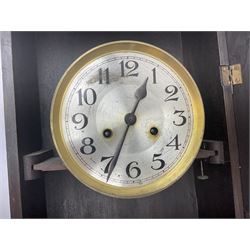 A 1930s spring driven wall clock