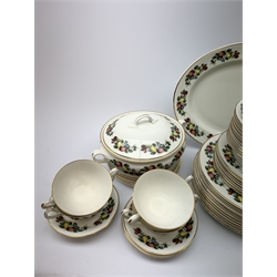 Staffordshire fruit decorated dinner wares, comprising twelve dinner plates, thirteen dessert plates, eighteen bowls, six twin handled soup bowls and six saucers, sauce boat and saucers, two tureen and covers, and a serving platter. 