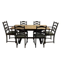 Oak refectory dining table, rectangular top on pierced end supports with sledge feet (W168cm D76cm H77cm); Set six (4+2)oak ladder back dining chairs, seats upholstered in foliate fabric, raised on turned supports (W46cm H95cm)