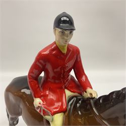 Beswick hunting group, comprising huntswoman on dappled grey horse no 1730, huntsman on bay horse no 1501, two fox figures no 1440 and 1748, and four fox hounds, all with printed marks beneath (8)