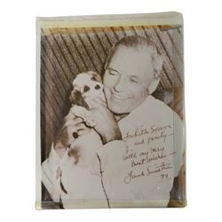 Frank Sinatra signed black and white photograph, the image depicting the singer holding a ...