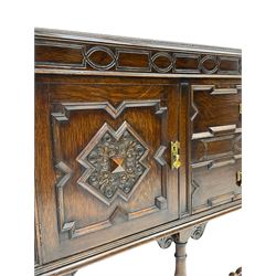 Early 20th century oak sideboard, fitted with two drawers and two cupboards, on turned supports joined by turned stretchers