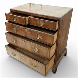 Georgian mahogany chest of drawers, the rectangular top above two short drawers over three long graduated drawers, each with brass swan neck handles and escutcheons, raised on shaped bracket feet