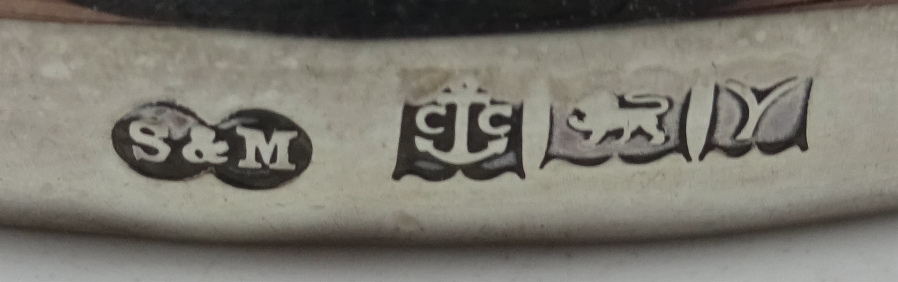 Pair silver candlesticks by Sanders & Mackenzie Birmingham 1977