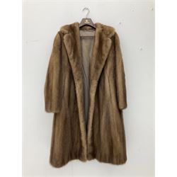 Ladies full length light brown mink fur coat, together with a ladies short dark brown rabbit fur coat and a ladies mid length fur coat.