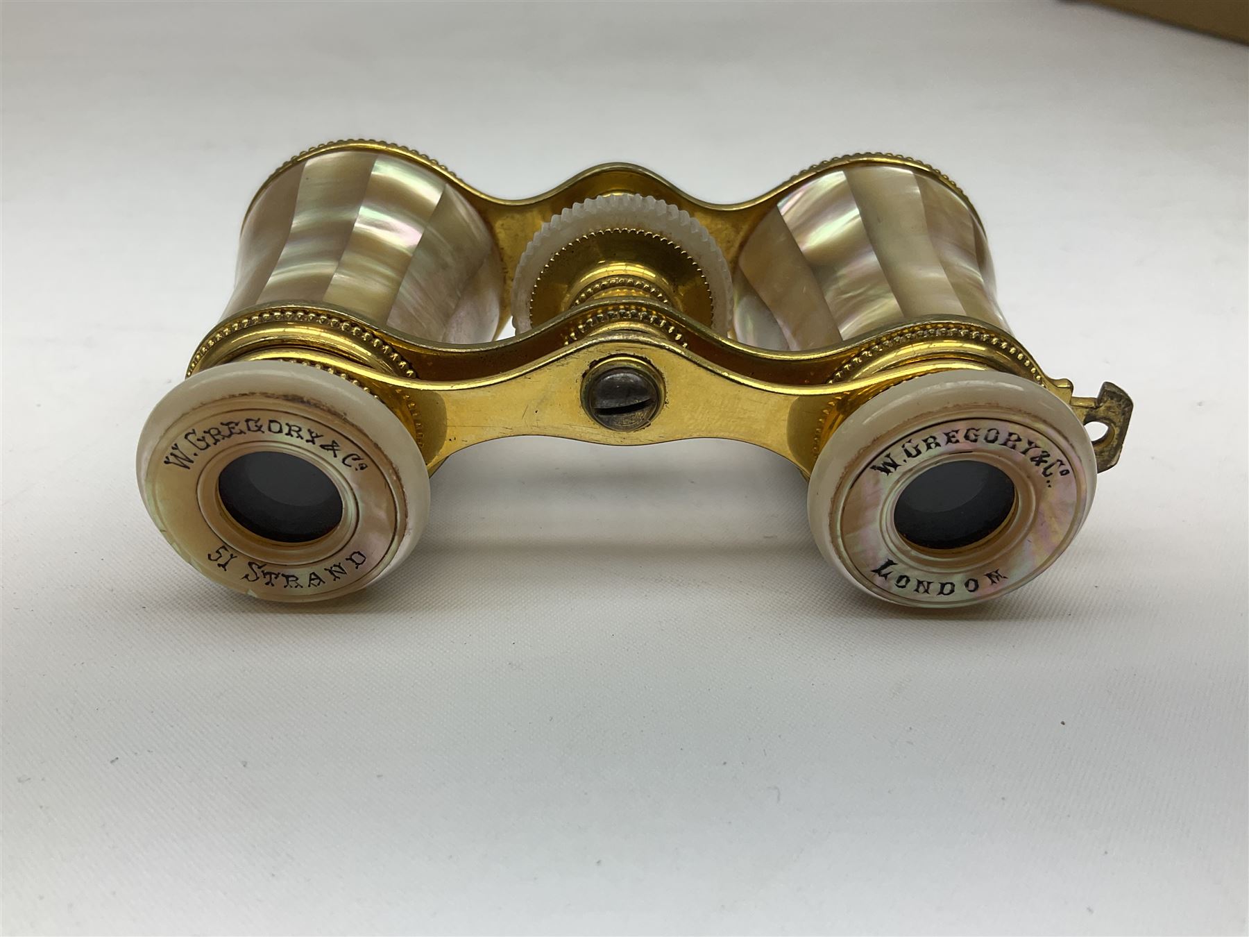 Pair of Victorian mother of pearl and gilt brass opera glasses, with