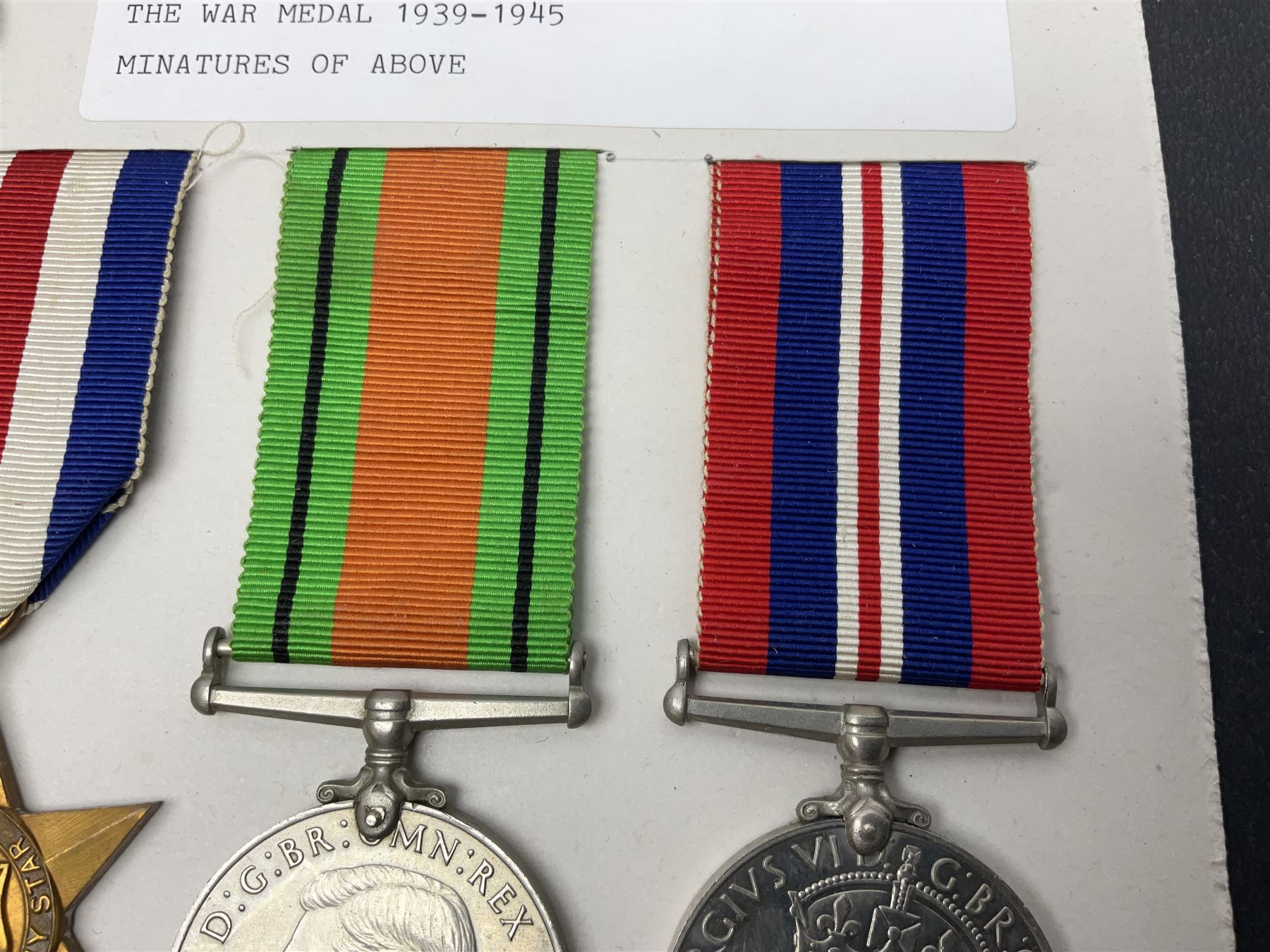 Representative display of WWII Campaign Stars and Medals comprising Burma Star, Italy Star, France & Germany Star, Defence Medal and War Medal 1939-1945; together with the corresponding group of miniatures; all with ribbons
