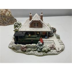 Five Lilliput Lanes, comprising Christmas at Woody Bay Station and Calling Home for Christmas both from the Illuminated collection, Castle of the Exiled Prince, Castle of The Ransomed King and Helvellyn, all with original boxes (5)
