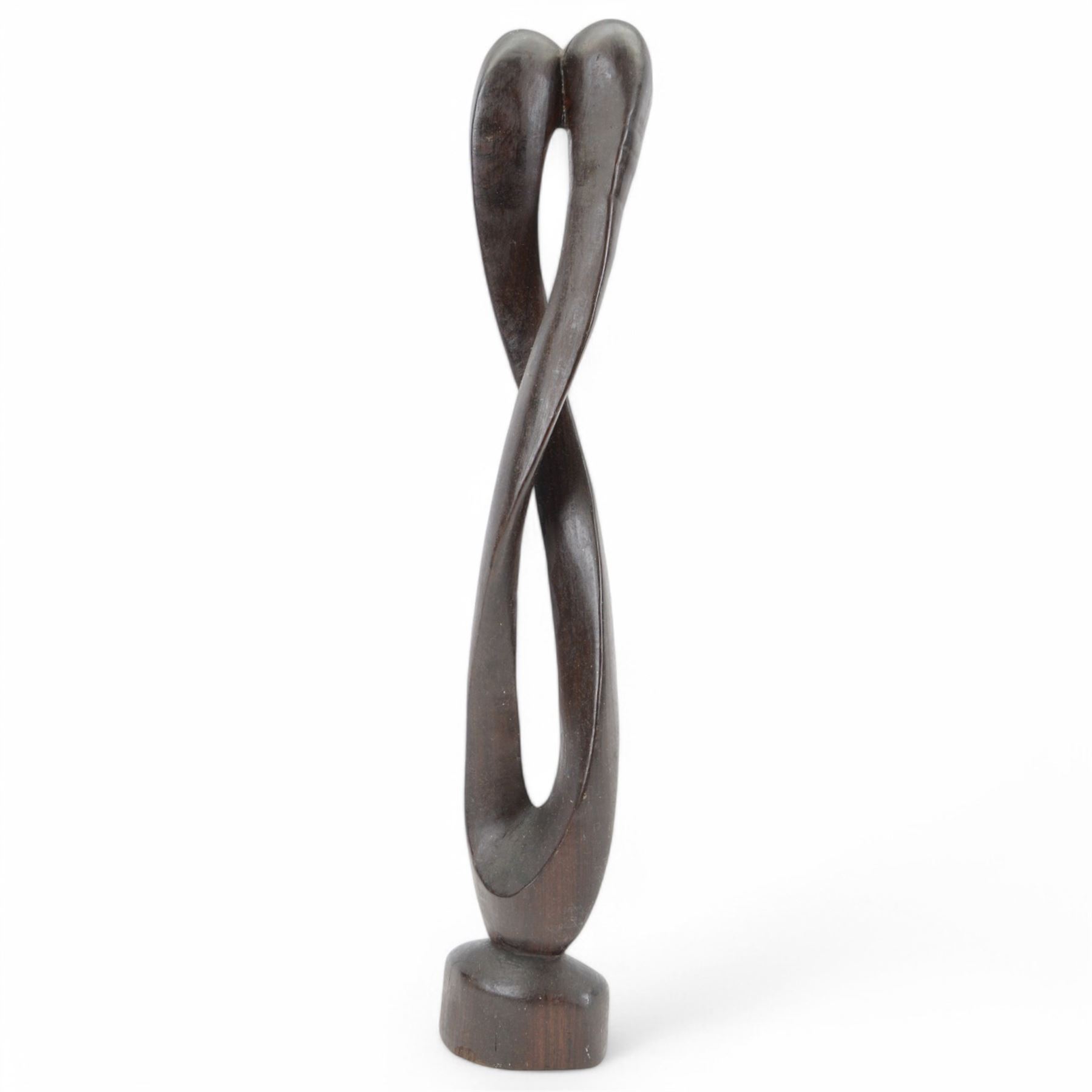 Two African carved abstract wooden sculptures, tallest H54cm