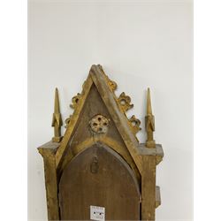 20th century giltwood framed painted panel, with Gothic style arched frame with barley twist columns, a Renaissance style trumpeting angel to the central panel, H69cm