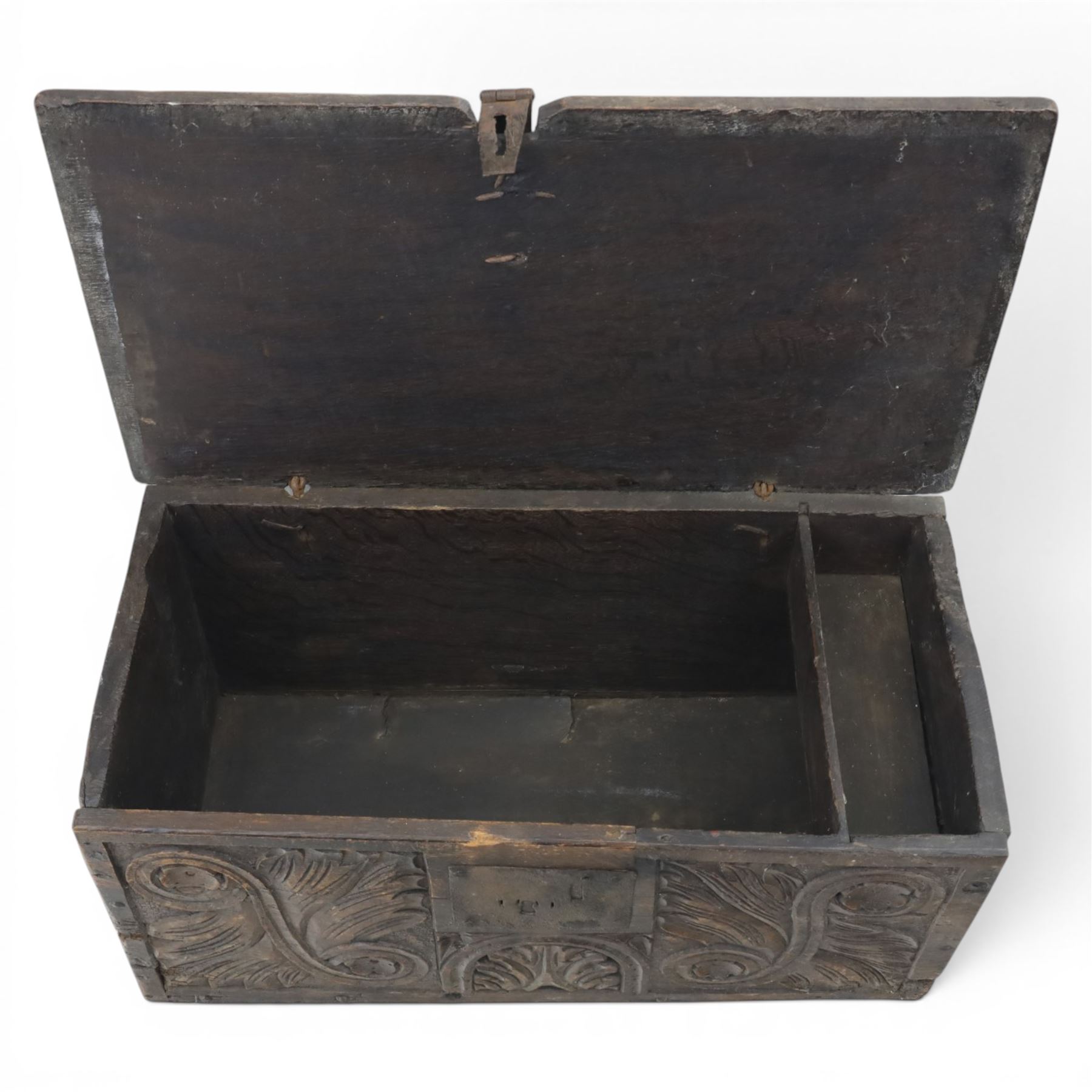 18th century small oak box with carved front, iron strap latch and hinges, fitted candlebox