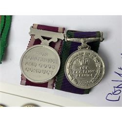 Eleven medal miniatures including Turkish Crimea, OBE (Civil), WW2 Burma Star and France/Germany Star, two pairs of WW2 War/Defence medals, LSGC etc; and two military badges