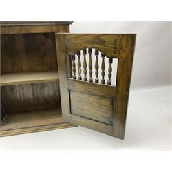 Oak dole cupboard / food hutch, the hinged panelled door with turned spindles enclosing a single shelf interior, H52cm D17cm W46cm